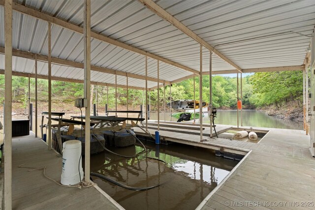 view of dock featuring a water view and boat lift
