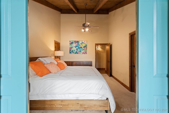 53402 E 332nd Loop, Jay, OK 74346 - bedroom featuring wood ceiling with exposed beams, light colored carpet, a high ceiling, and baseboards