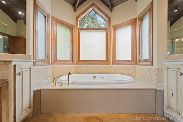 53402 E 332nd Loop, Jay, OK 74346 - bathroom with a bath, vanity, lofted ceiling, and a shower