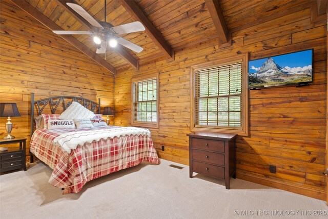 bedroom with lofted ceiling with beams, carpet floors, wood walls, wooden ceiling, and visible vents