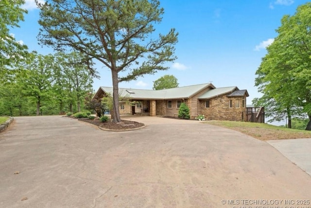 53402 E 332nd Loop, Jay, OK 74346 - view of front of house with stone siding and curved driveway