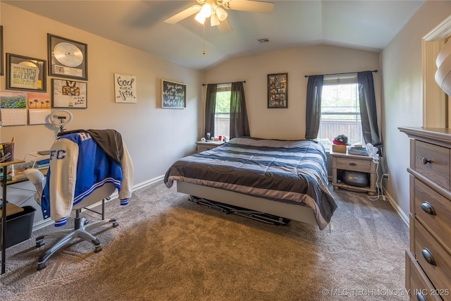 bedroom featuring carpet floors, multiple windows, vaulted ceiling, and visible vents