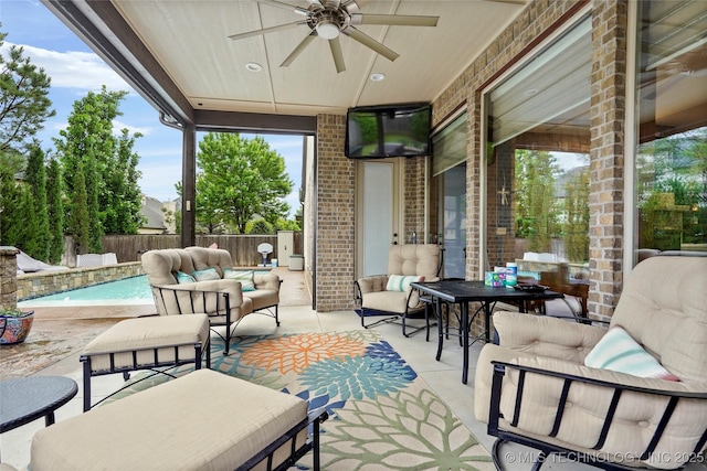 view of patio with an outdoor living space, a fenced backyard, ceiling fan, and a fenced in pool