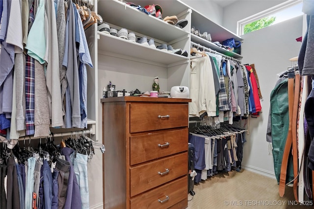 4401 S Quinoa Ave, Broken Arrow, OK 74011 - walk in closet featuring light colored carpet