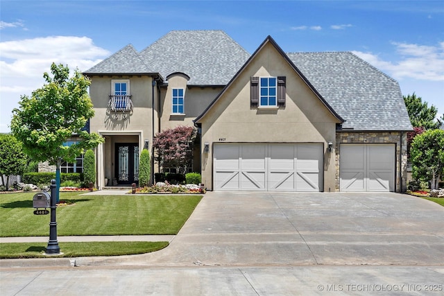 4401 S Quinoa Ave, Broken Arrow, OK 74011 - view of front of house featuring stucco siding, concrete driveway, a front lawn, and an attached garage