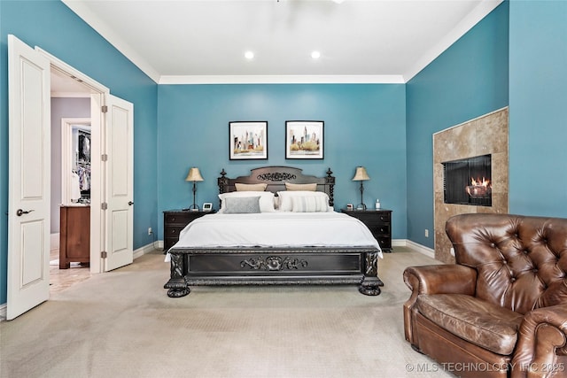 4401 S Quinoa Ave, Broken Arrow, OK 74011 - bedroom with carpet floors, a tiled fireplace, recessed lighting, and crown molding