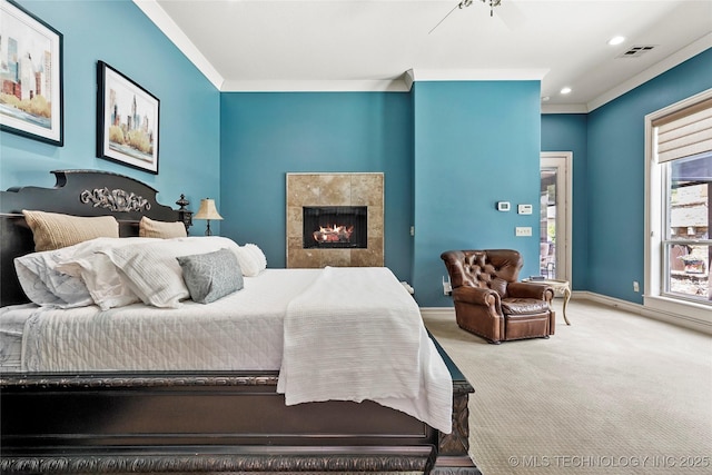 4401 S Quinoa Ave, Broken Arrow, OK 74011 - bedroom with carpet flooring, a fireplace, recessed lighting, and crown molding