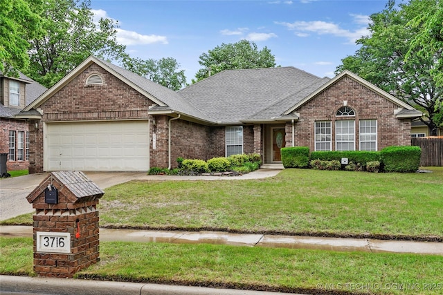 single story home featuring a garage, a shingled roof, driveway, and brick siding