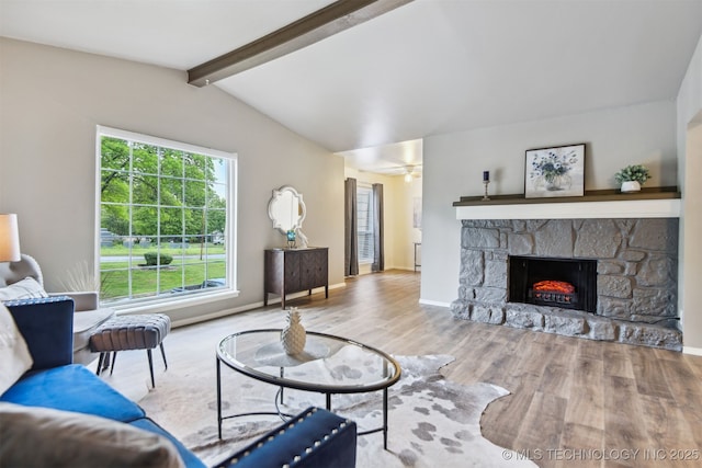 6727 S Richmond Ave Unit 632, Tulsa, OK 74136 - living room with wood finished floors, a fireplace, baseboards, and a ceiling fan
