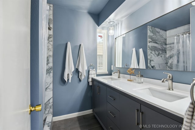 6727 S Richmond Ave Unit 632, Tulsa, OK 74136 - full bath with double vanity, curtained shower, and baseboards