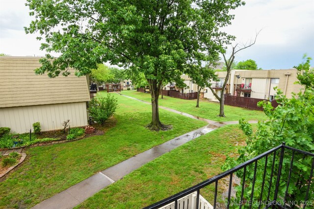 6727 S Richmond Ave Unit 632, Tulsa, OK 74136 - view of property's community with a lawn