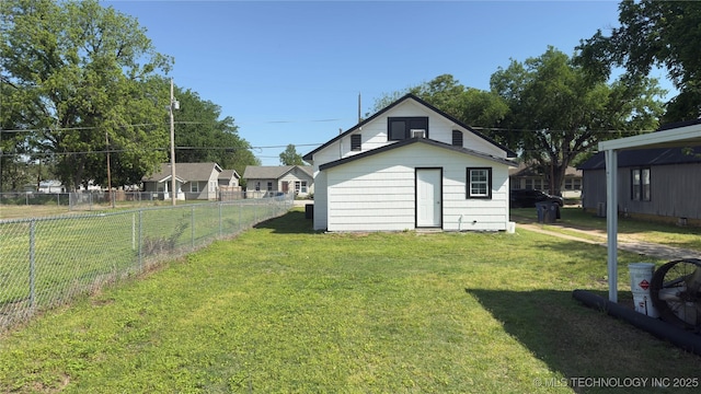 view of outbuilding with fence