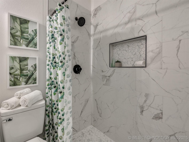 full bath with a marble finish shower and toilet