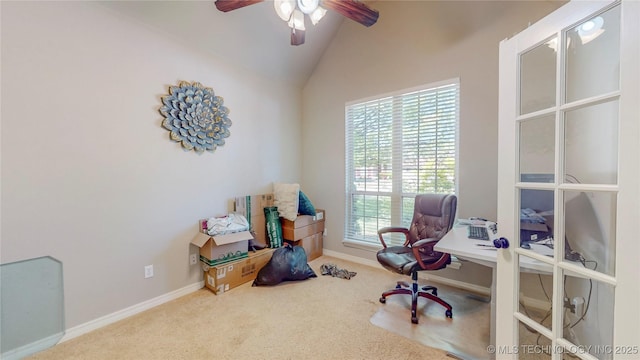 carpeted office space with baseboards, a ceiling fan, and lofted ceiling