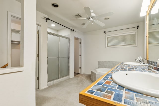 1491 Southpointe Rd, Eucha, OK 74342 - full bathroom with visible vents, a sink, ceiling fan, and a stall shower