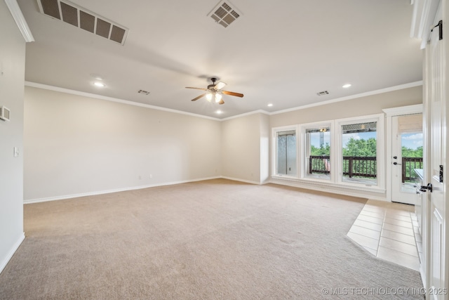 carpeted spare room featuring recessed lighting, ceiling fan, visible vents, and baseboards