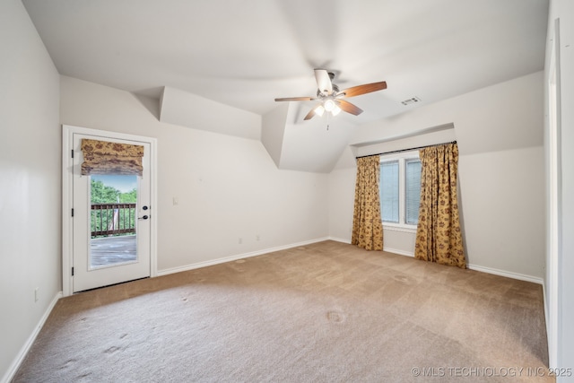 bonus room featuring carpet floors, a ceiling fan, and a healthy amount of sunlight