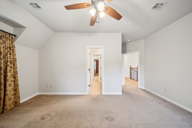 unfurnished bedroom with baseboards, visible vents, and light colored carpet