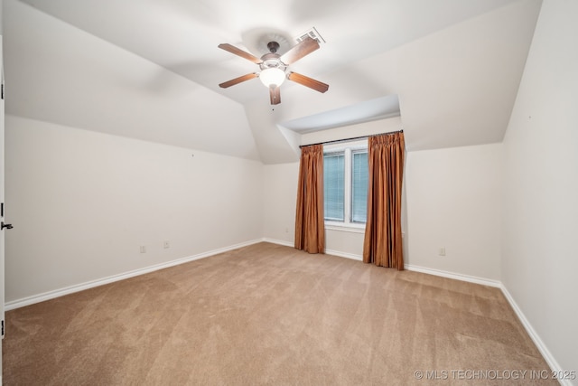 bonus room featuring ceiling fan, light carpet, vaulted ceiling, and visible vents