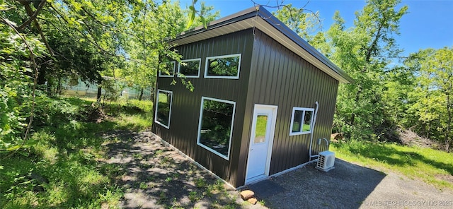 view of outbuilding with ac unit