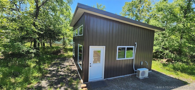 view of outbuilding with ac unit