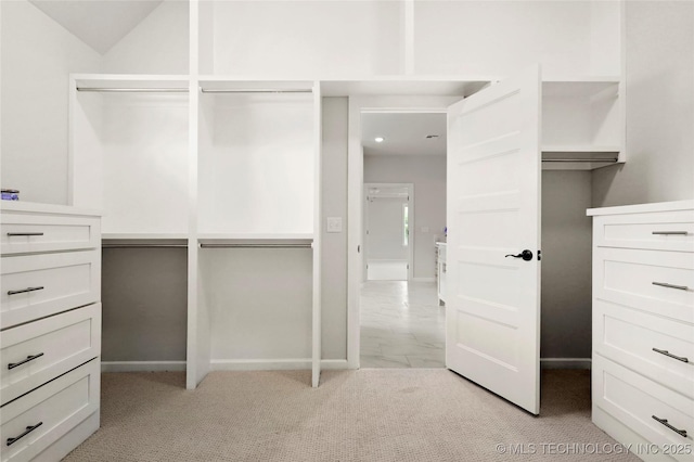 15916 E 106th Pl, Owasso, OK 74055 - walk in closet featuring light colored carpet