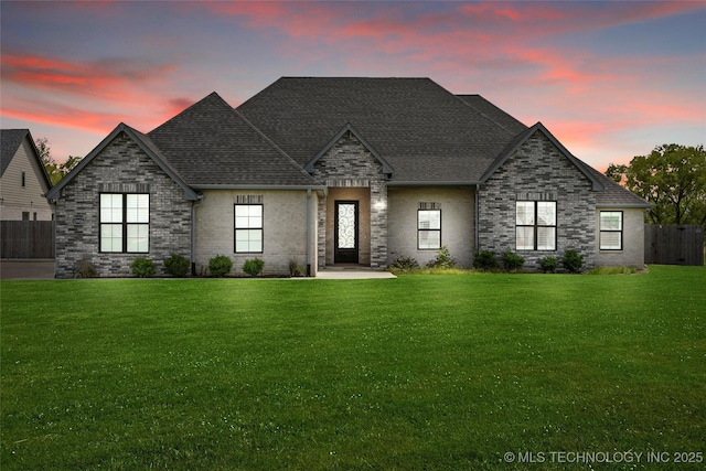 15916 E 106th Pl, Owasso, OK 74055 - exterior space featuring a shingled roof, brick siding, fence, and a lawn
