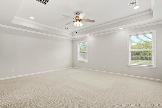 15916 E 106th Pl, Owasso, OK 74055 - empty room featuring crown molding, a ceiling fan, visible vents, and a raised ceiling
