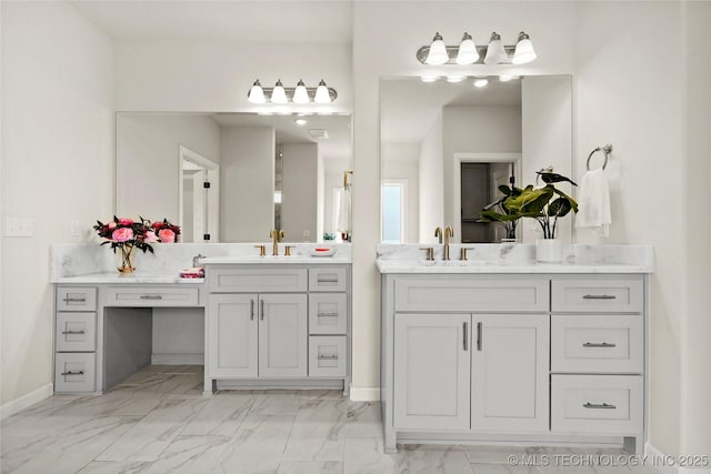 15916 E 106th Pl, Owasso, OK 74055 - full bath with marble finish floor, two vanities, and a sink
