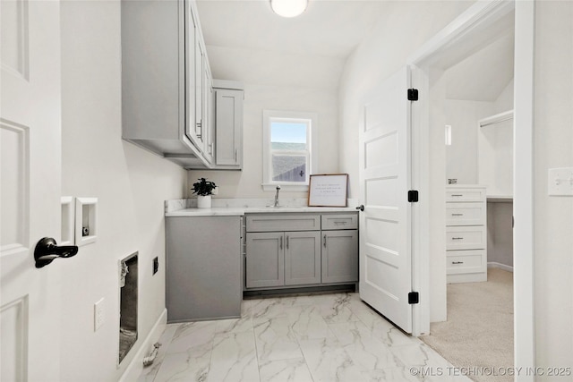 15916 E 106th Pl, Owasso, OK 74055 - laundry room featuring a sink, cabinet space, washer hookup, hookup for an electric dryer, and marble finish floor