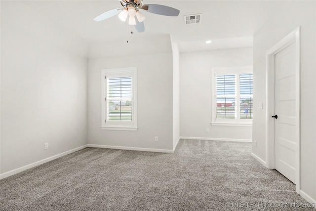 15916 E 106th Pl, Owasso, OK 74055 - carpeted empty room with baseboards, ceiling fan, and visible vents