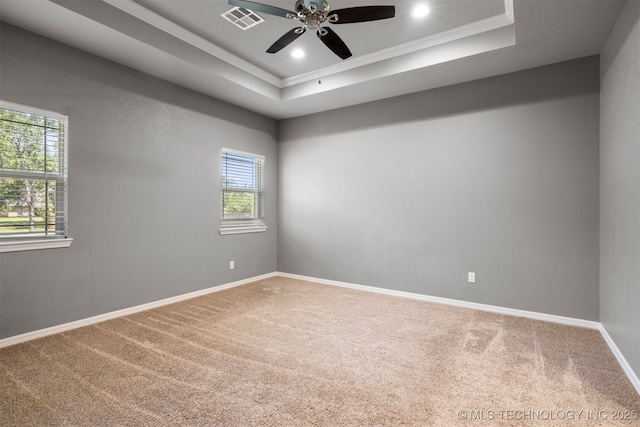 543 Edgewood, Durant, OK 74701 - spare room with a raised ceiling, plenty of natural light, carpet, a ceiling fan, and crown molding