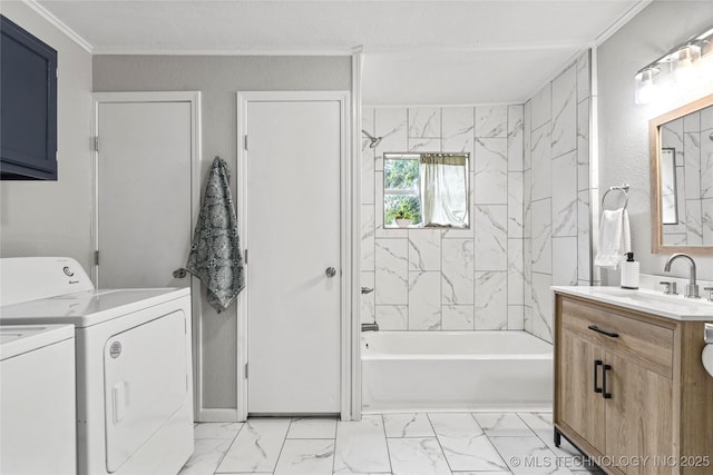 full bathroom featuring independent washer and dryer, vanity, marble finish floor, shower / bathing tub combination, and ornamental molding