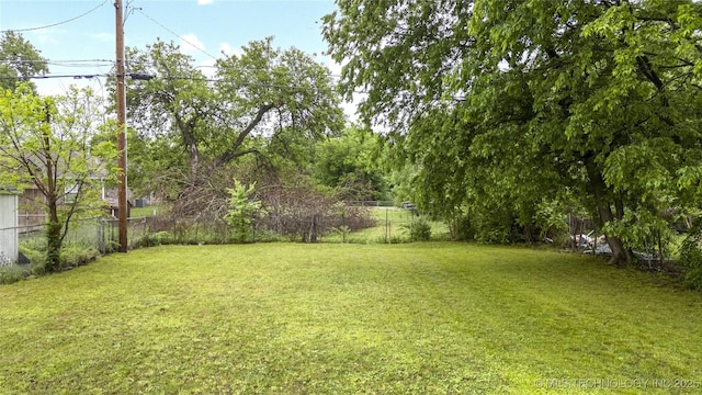 view of yard with fence