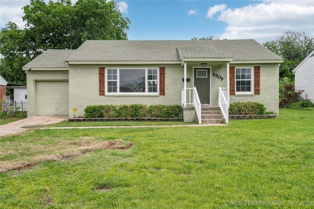 single story home featuring concrete driveway, brick siding, a front yard, and a garage