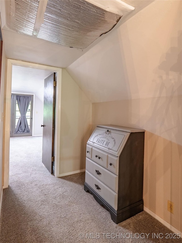 bonus room featuring baseboards, carpet flooring, and vaulted ceiling