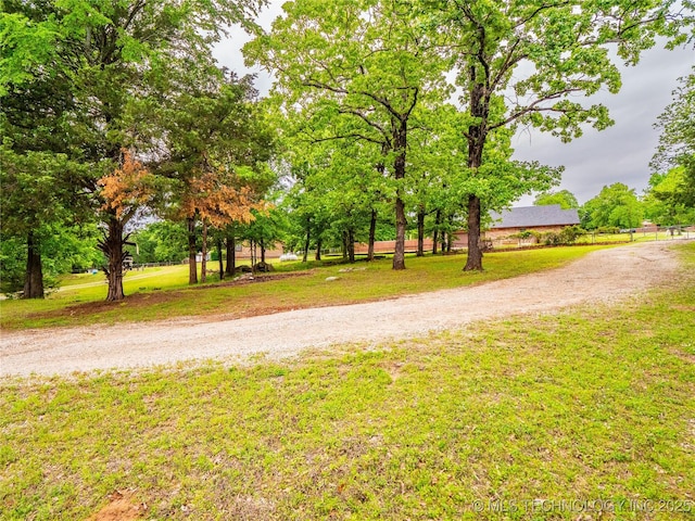 surrounding community with a yard