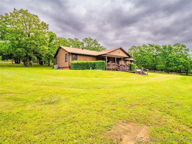 exterior space with a yard
