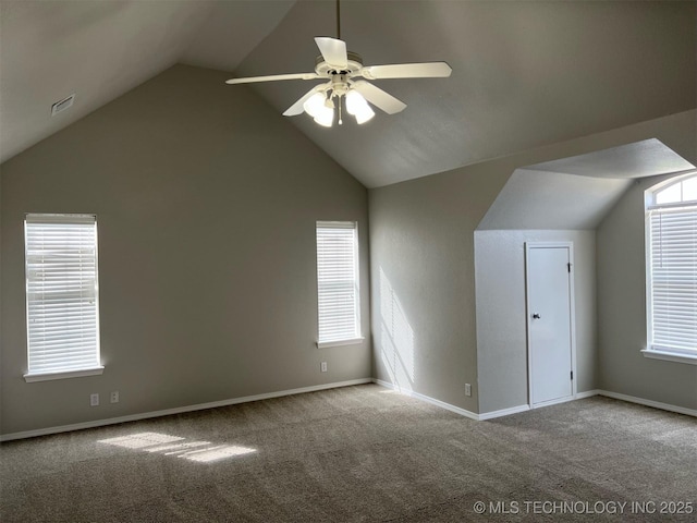 bonus room featuring visible vents, baseboards, ceiling fan, carpet flooring, and vaulted ceiling