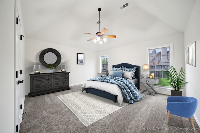 bedroom with carpet, lofted ceiling, baseboards, and a ceiling fan