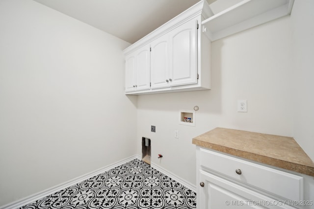 clothes washing area featuring hookup for a gas dryer, electric dryer hookup, baseboards, cabinet space, and hookup for a washing machine