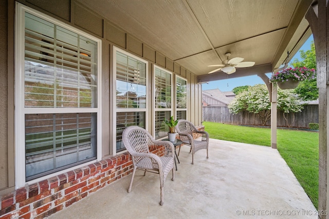 view of patio / terrace featuring ceiling fan