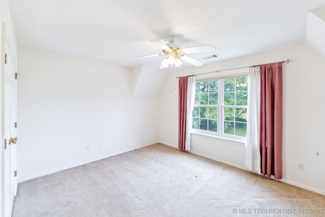 bonus room featuring carpet floors, ceiling fan, visible vents, and baseboards