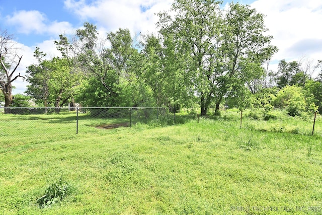 view of yard with fence