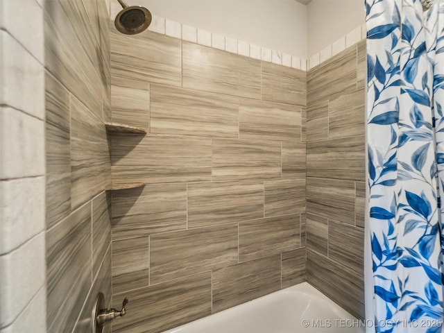 bathroom with shower / bath combination with curtain