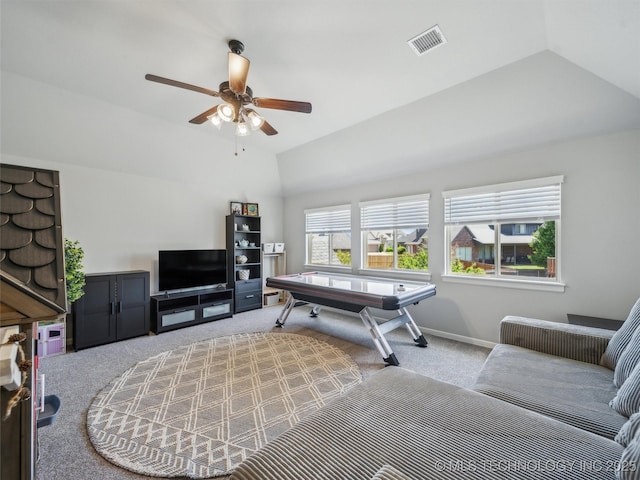 rec room featuring visible vents, light carpet, ceiling fan, and lofted ceiling