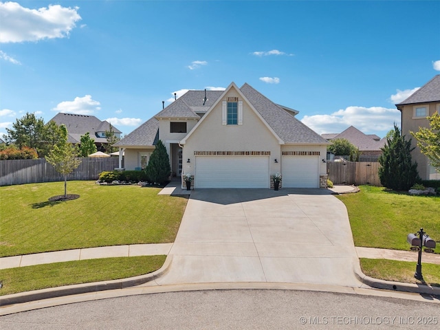 traditional-style home featuring a front lawn, roof with shingles, fence, and driveway