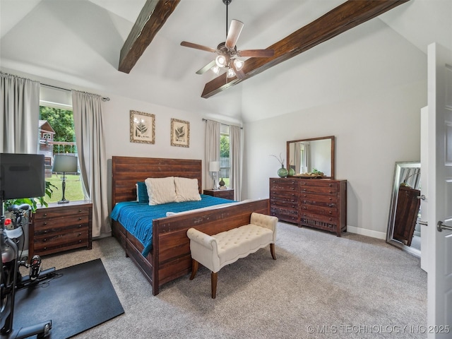 bedroom with carpet flooring, a ceiling fan, lofted ceiling with beams, and multiple windows