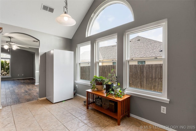 3933 S 199th E Ave, Broken Arrow, OK 74014 - interior space featuring high vaulted ceiling, ceiling fan, baseboards, and visible vents
