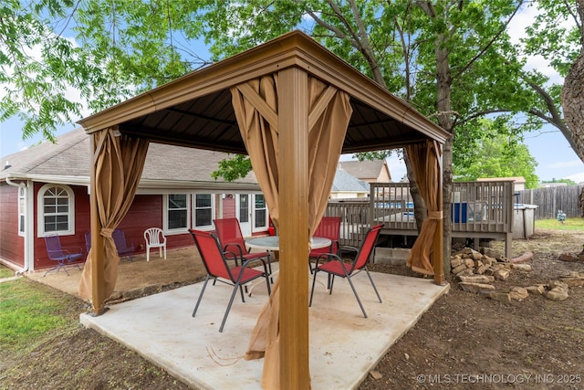 3933 S 199th E Ave, Broken Arrow, OK 74014 - view of patio / terrace featuring a deck, a gazebo, fence, and outdoor dining area